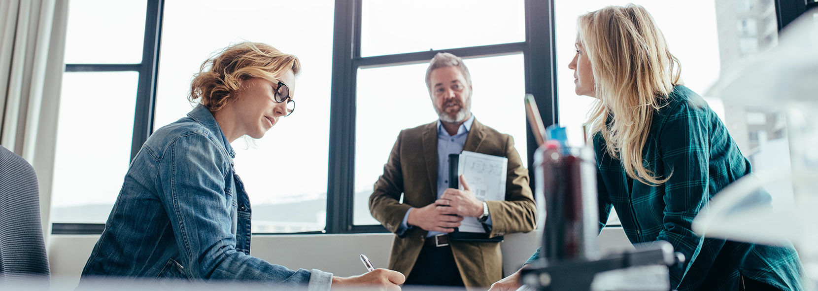 Modern business team planning equipment financing